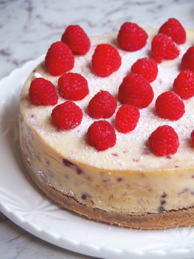 baked lemon and raspberry cheesecake side view left