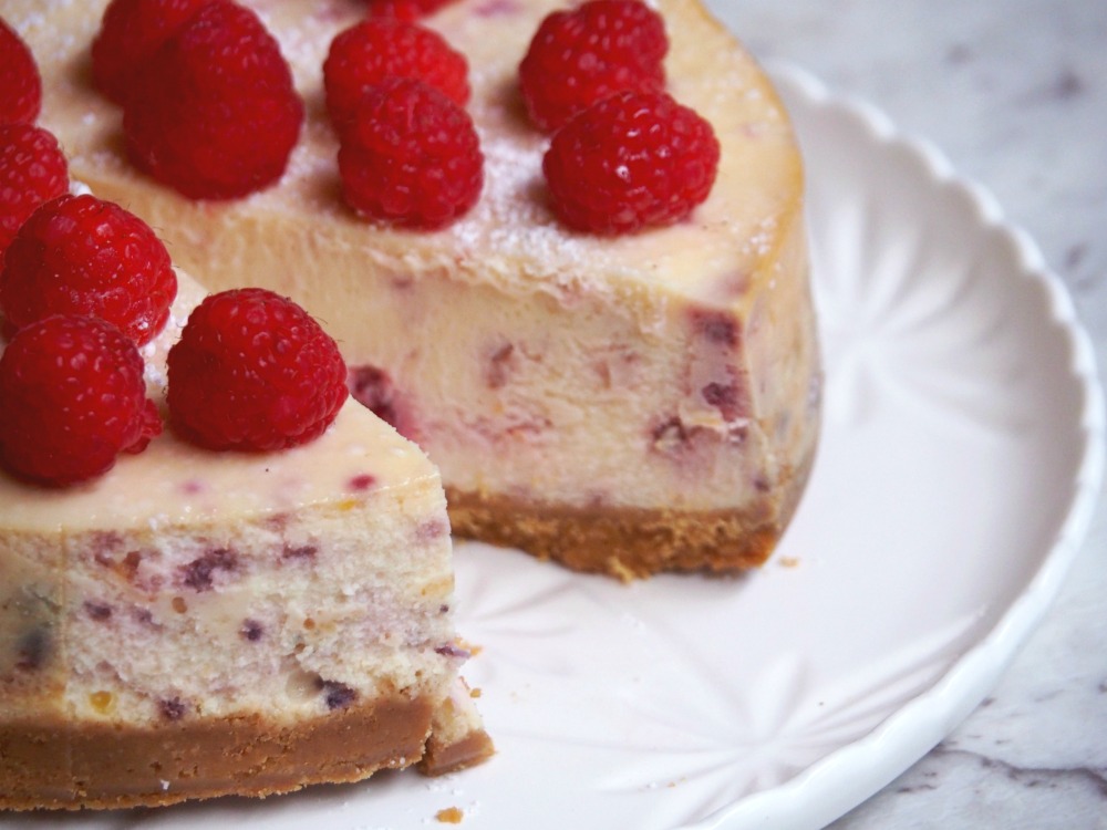 baked lemon and raspberry cheesecake cut