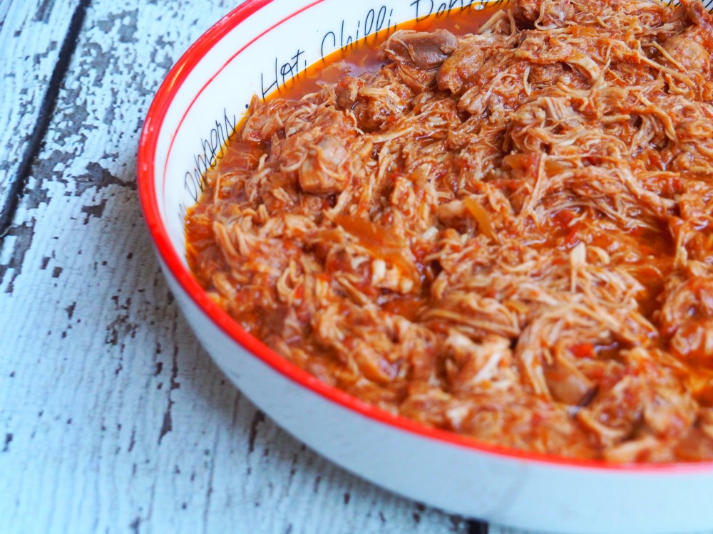 slow cooker pulled chicken in a dish