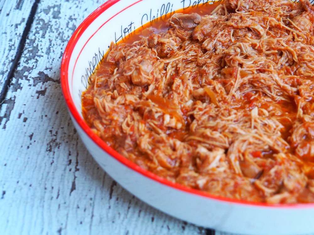 slow cooker pulled chicken in a dish