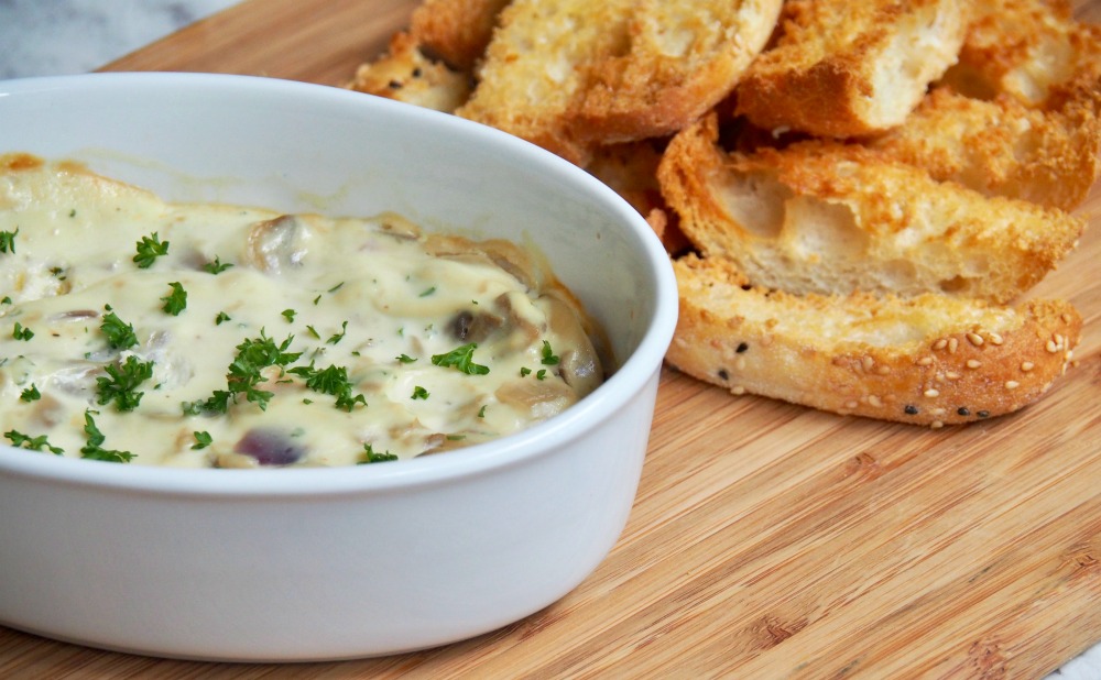 baked ricotta mushroom dip with breadsticks