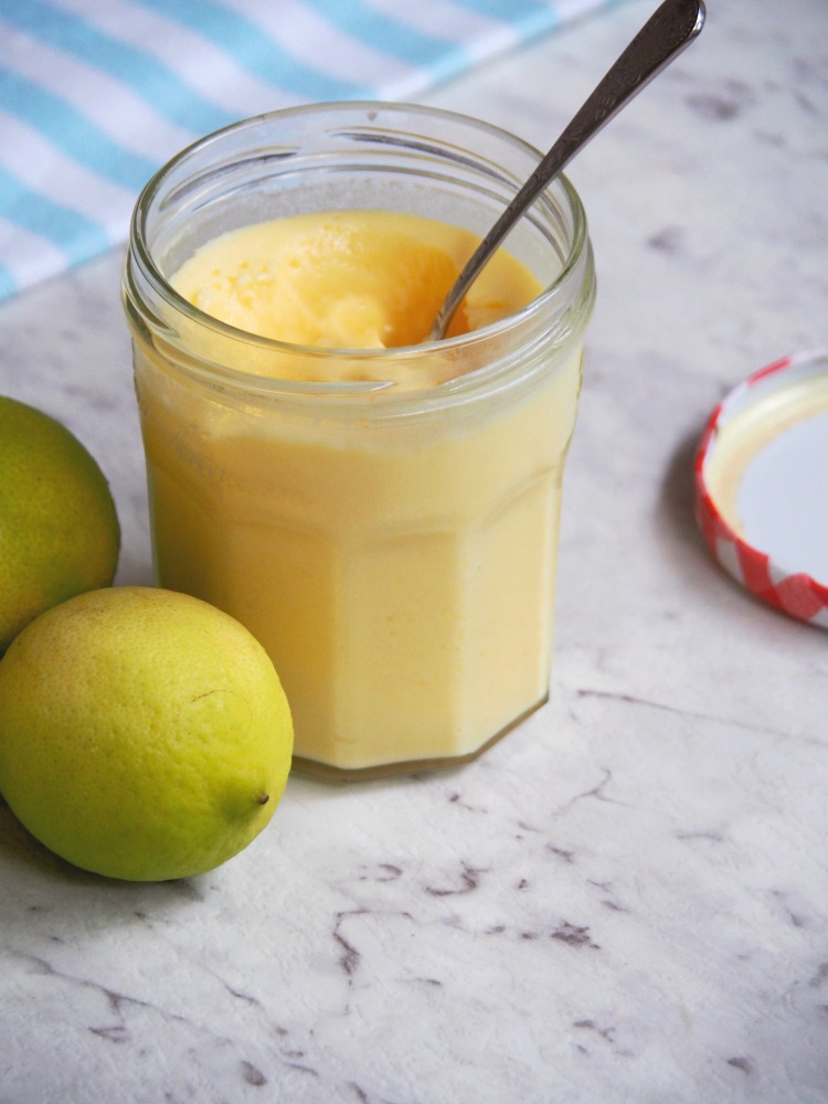 spoon placed in jar of lime butter