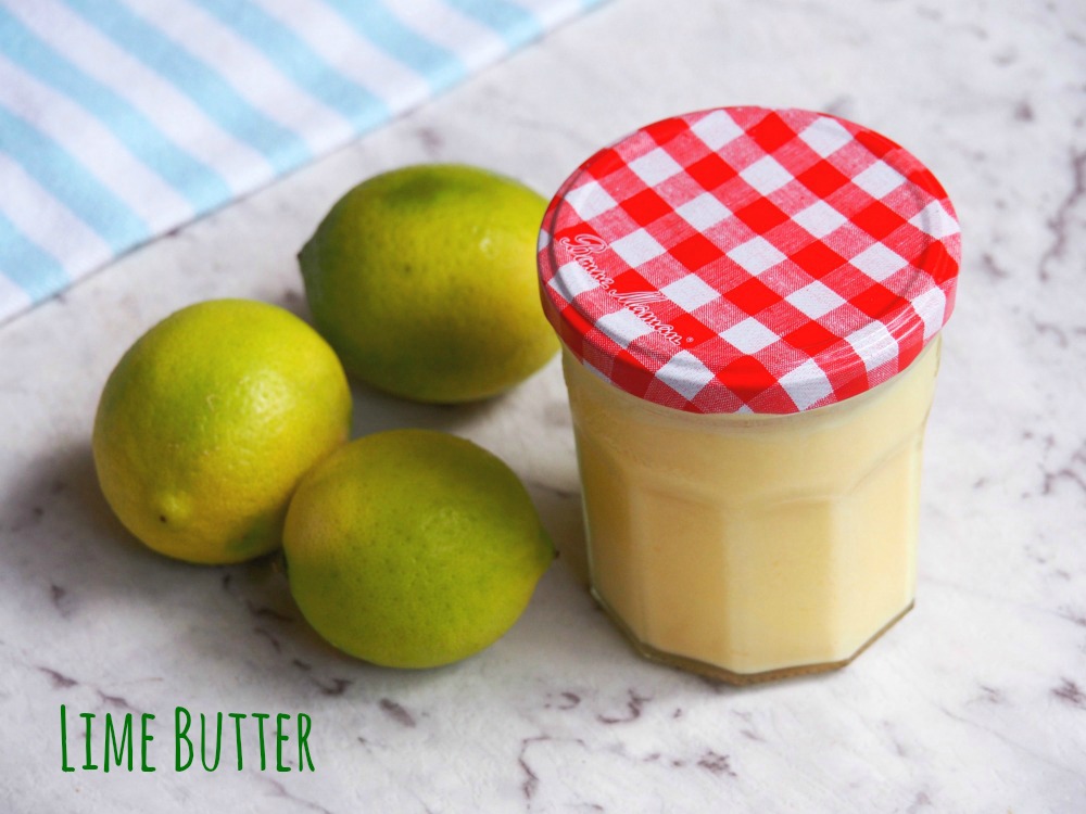 jar of lime butter with some limes