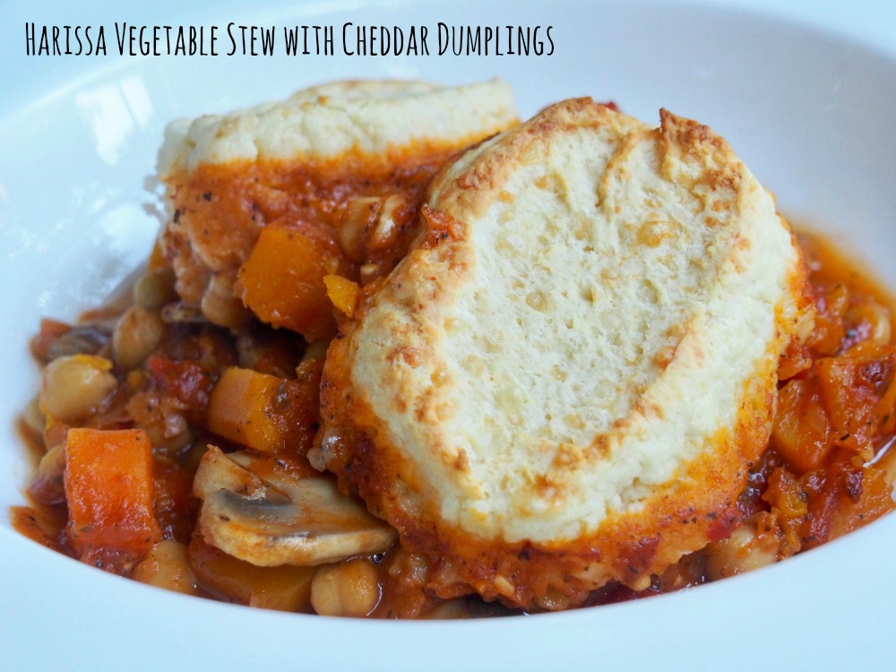 harissa vegetable stew with cheddar dumplings title