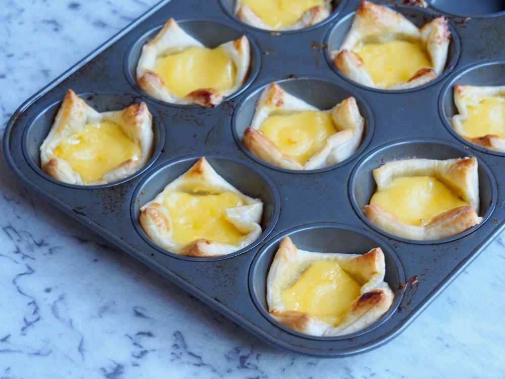 lime butter puffs in muffin tin