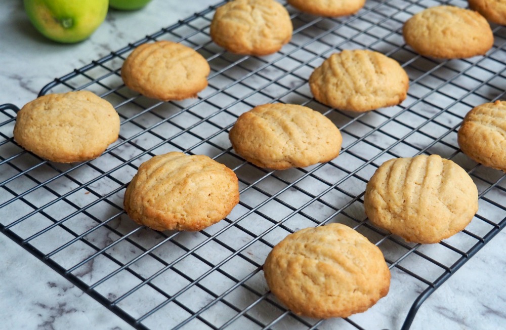 lime coconut cream cheese cookies on cooling rack