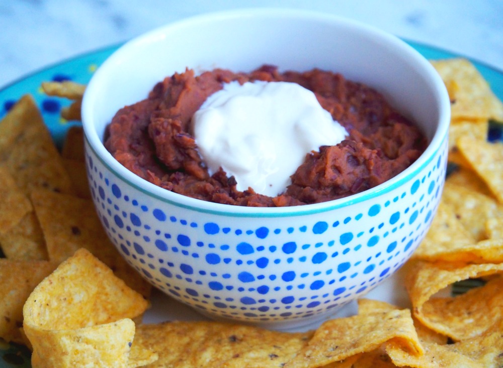 bowl of Mexican bean dip with tortilla chips