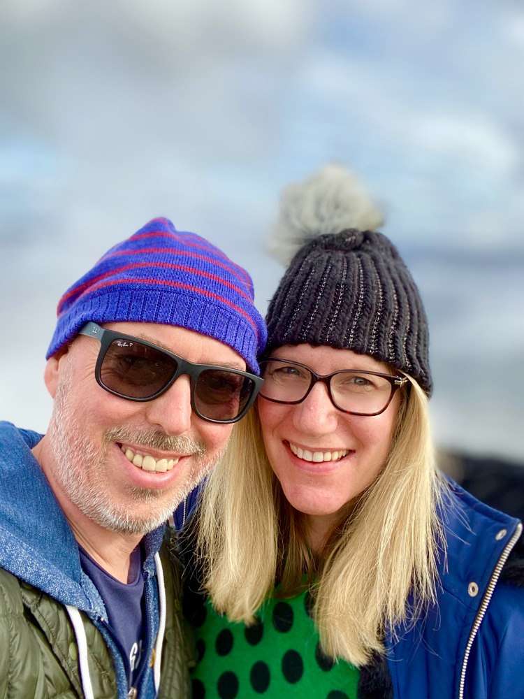 two people in front of clouds at sublime lookout