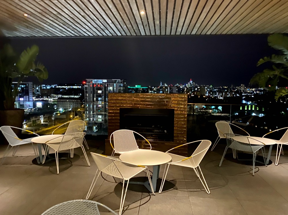 hotel terrace with white outdoor furniture