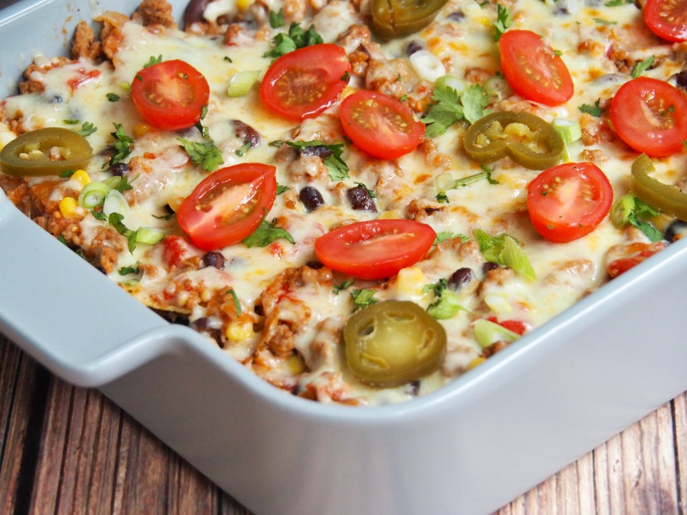 corner of dish of loaded turkey nachos