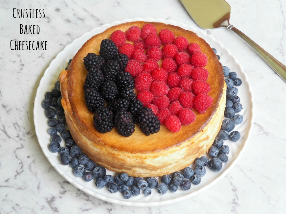 crustless cheesecake topped with blackberries and raspberries