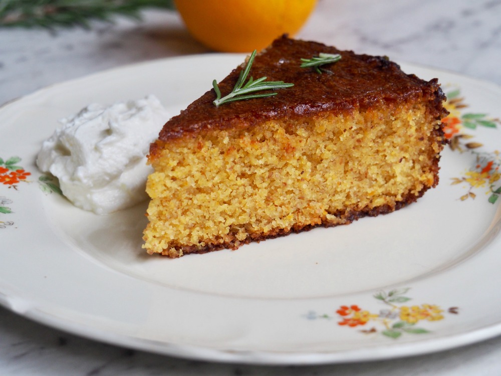 slice of gluten free orange cake with rosemary