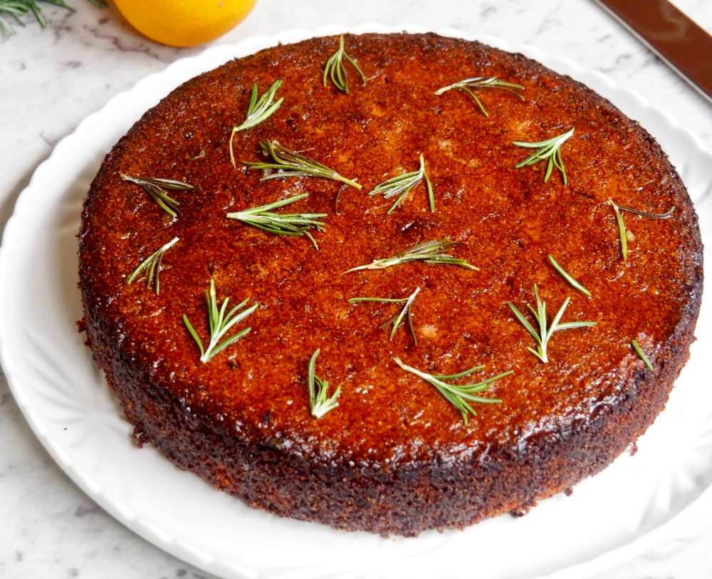 gluten free orange cake with rosemary sprigs