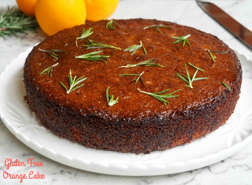 gluten free orange cake with rosemary sprigs