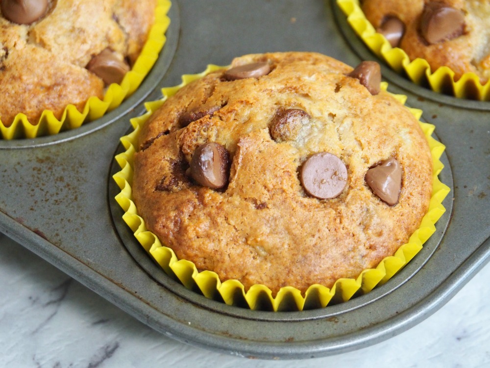 close up pear choc chip muffin in tin