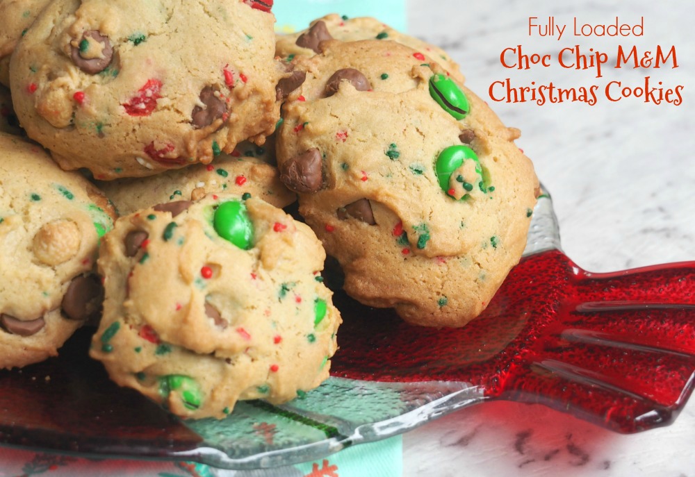 plate of fully loaded christmas choc chip m and m cookies