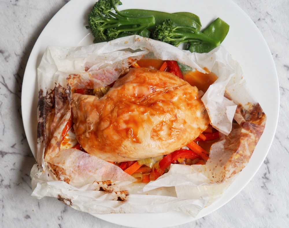 sticky oyster chicken in a paper parcel