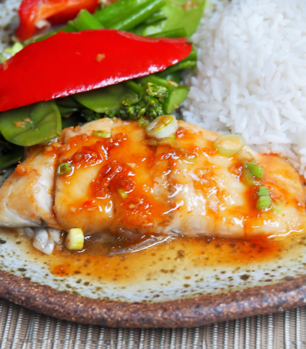 soy and sweet chilli fish with steamed rice and Asian greens