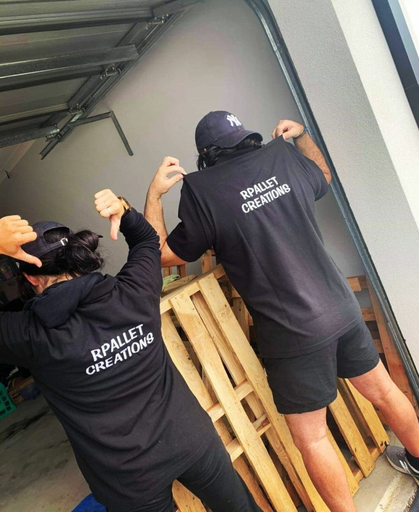 man and woman wearing hoodies saying rpallet creations