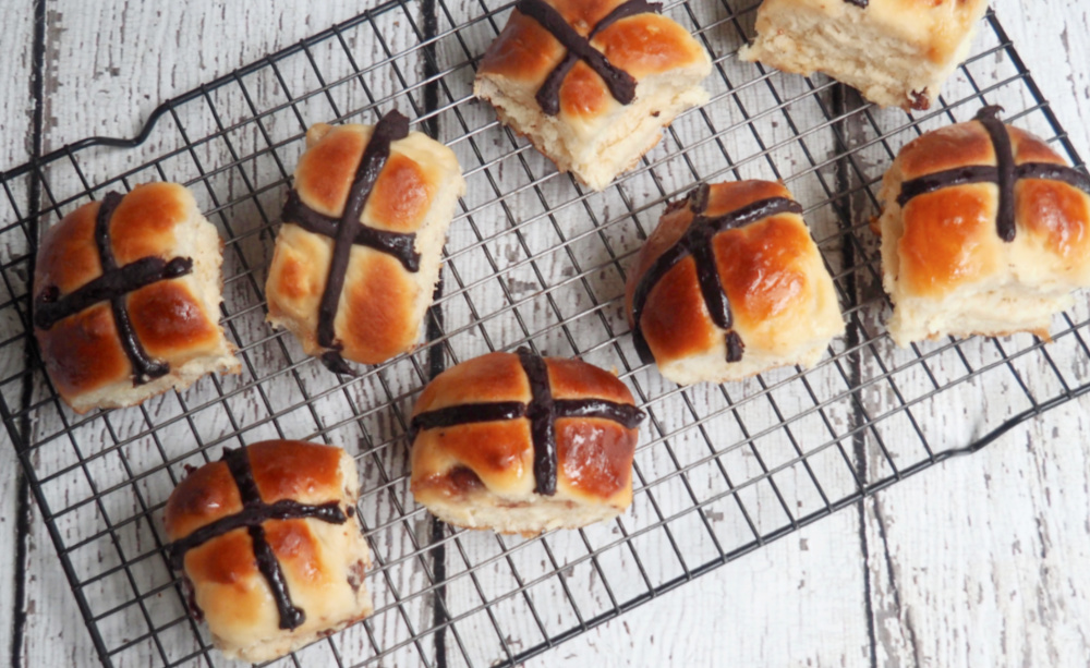 choc fudge hot cross buns on cooling rack