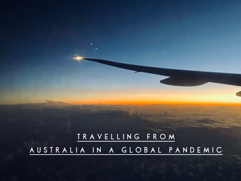 looking out over plane wing in night sky