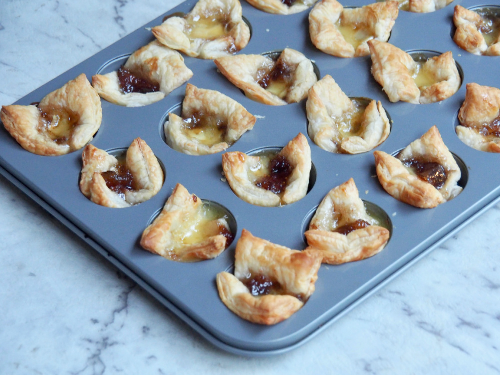 fig jam and brie bites in mini muffin tray