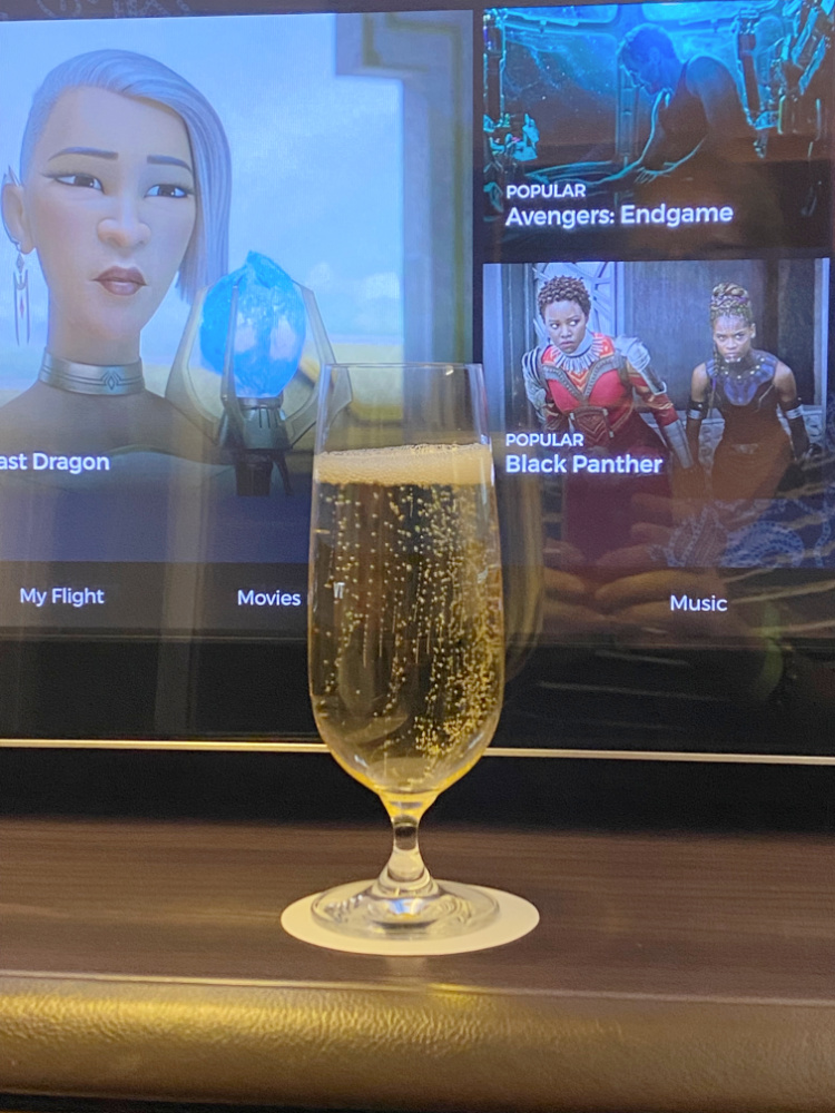 Glass of champagne in Singapore airlines first class