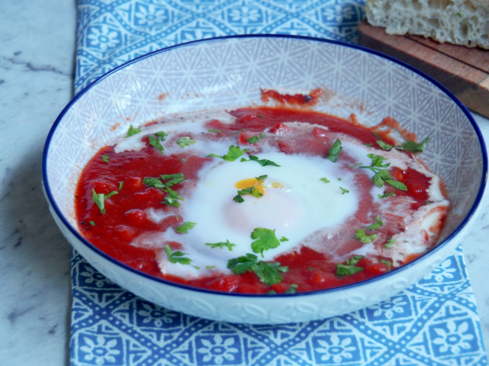 a bowl of shakshuka eggs