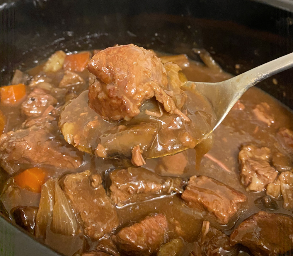 spoonful of slow cooker beef in stout