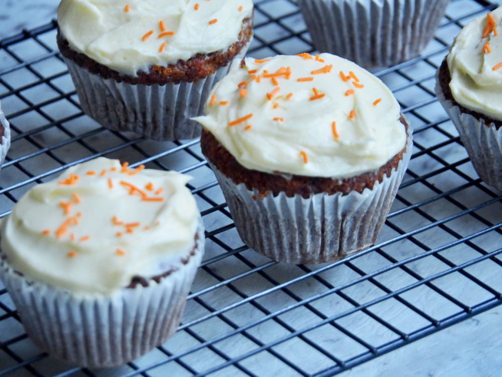 carrot cake cupcakes on cooling rack