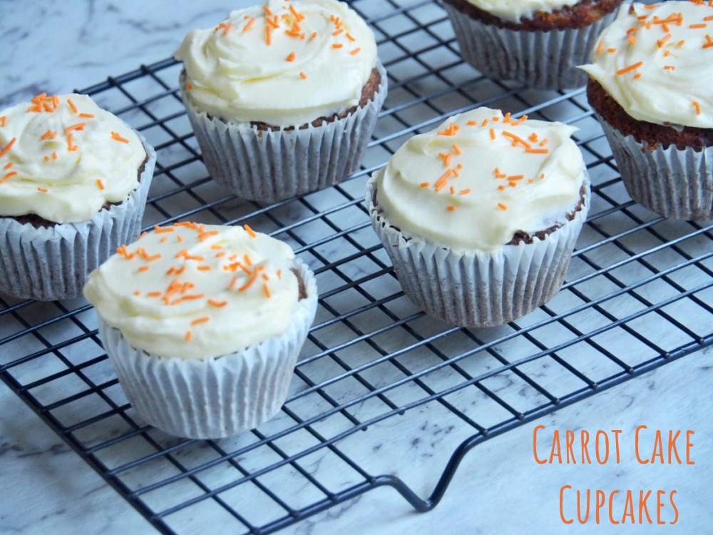 carrot cake cupcakes on a wire rack