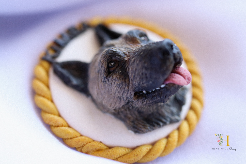 small polymer cattle dog sculpture