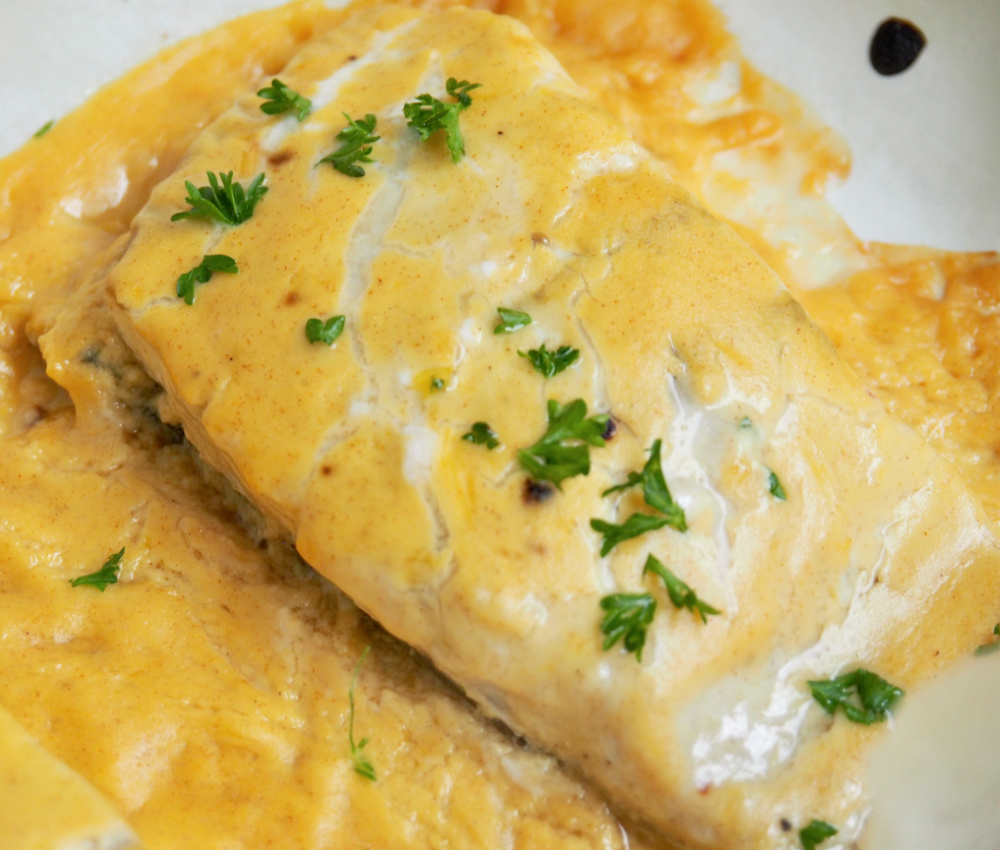 fish fillet baked in orange mustard sauce