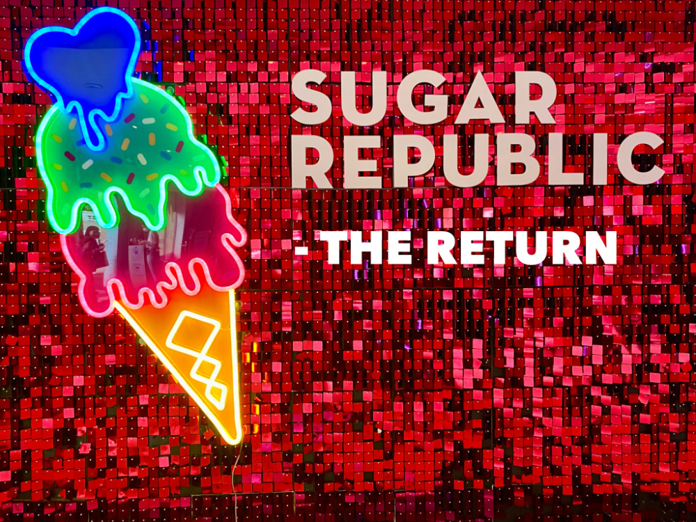 red sequin background with neon ice cream and letters saying Sugar Republic