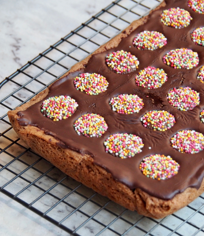 melt and mix weetbix slice with freckles on top