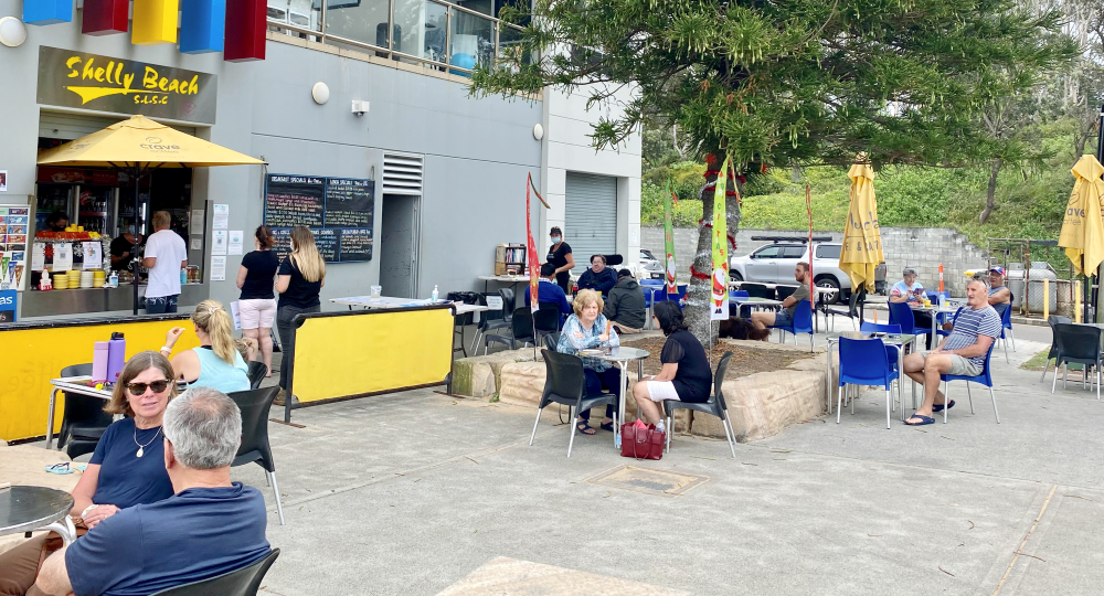 view of outdoor cafe on ground floor of surf club