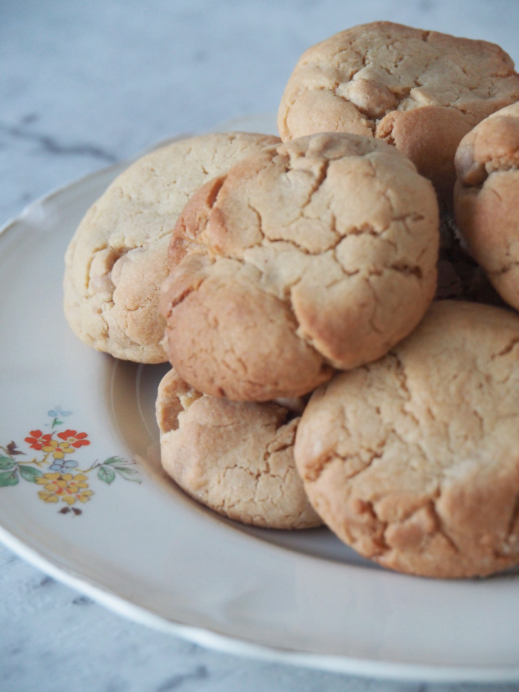 side view of plate of peanut butter chip cookies