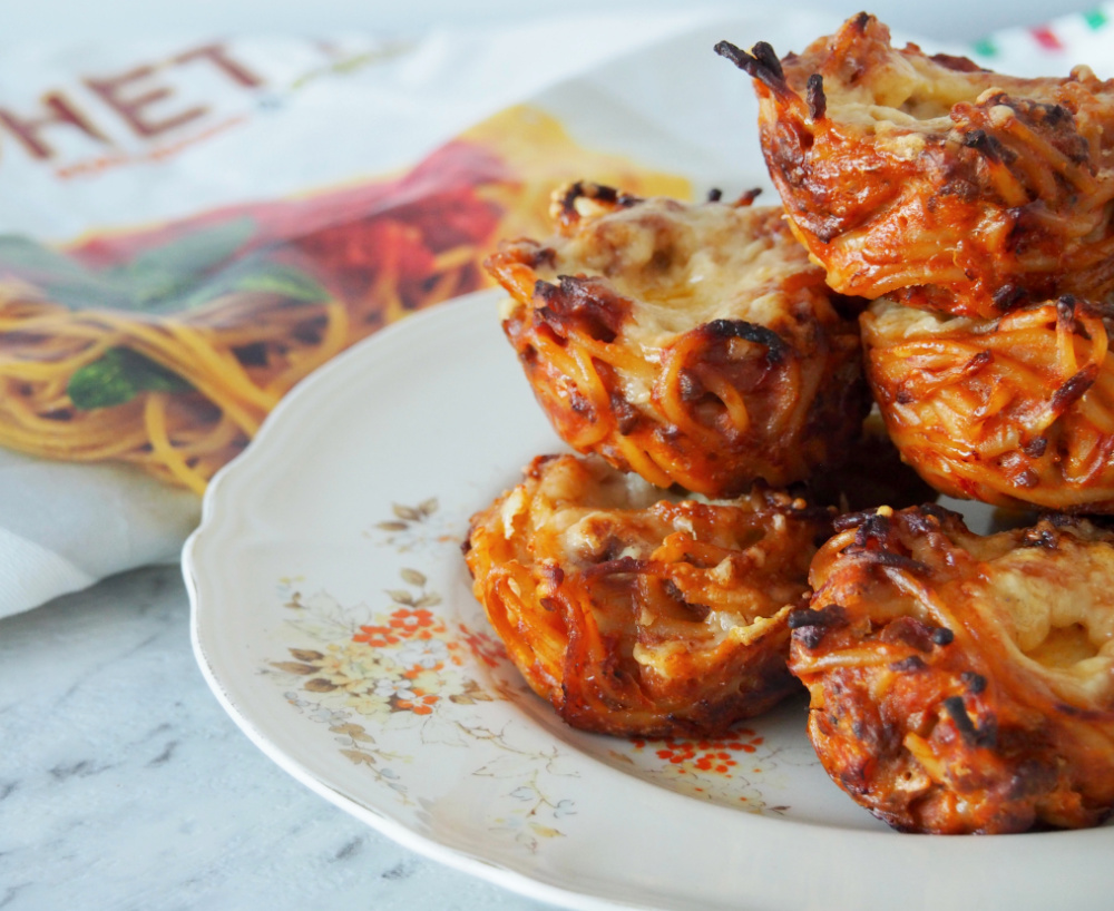 side view of a plate of spaghetti bolognese muffins