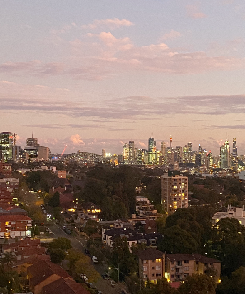 looking at the sydney skyline at dusk