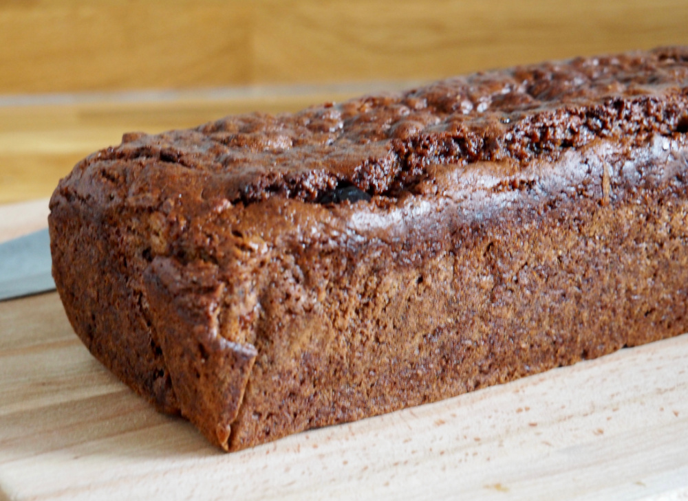 side view of persimmon cranberry and walnut loaf