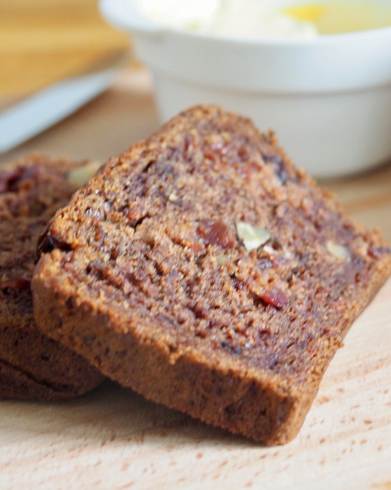 slices of persimmon cranberry and walnut loaf