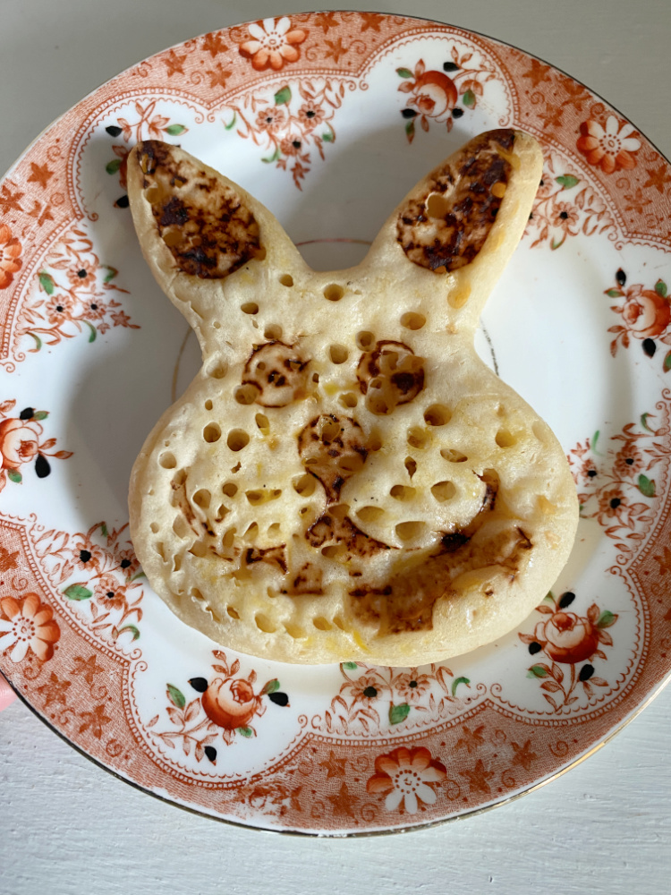 bunny shaped crumpet on a small vintage side plate