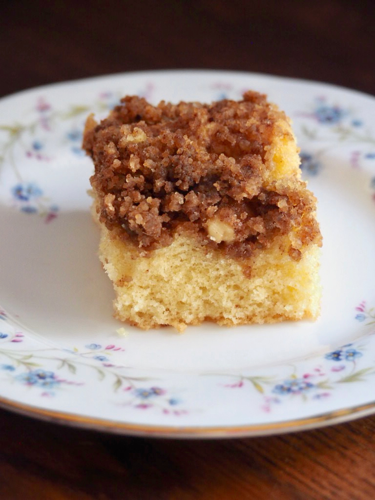 crunchy  walnut square on a plate on a vintage plate decorated with blue flowers