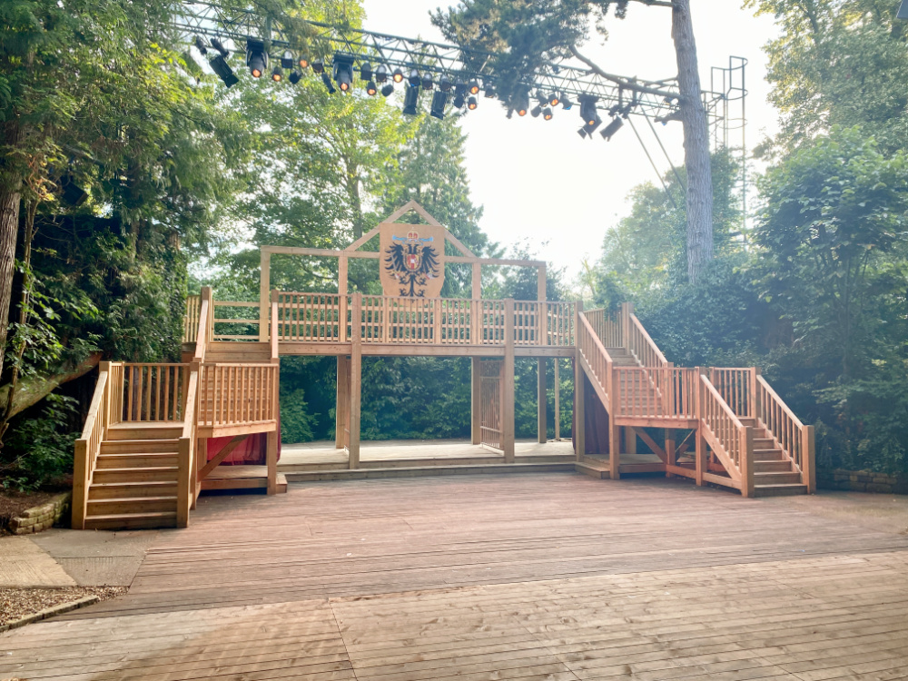 wooden stage set at an outdoor theatre